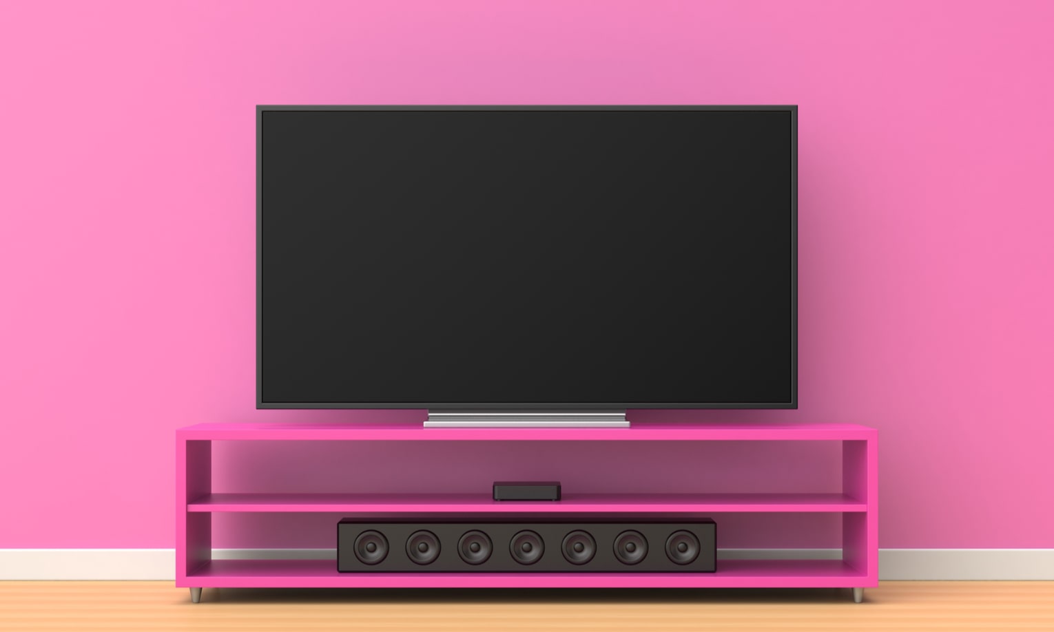 динамики системы soundbar на розовом фоне
